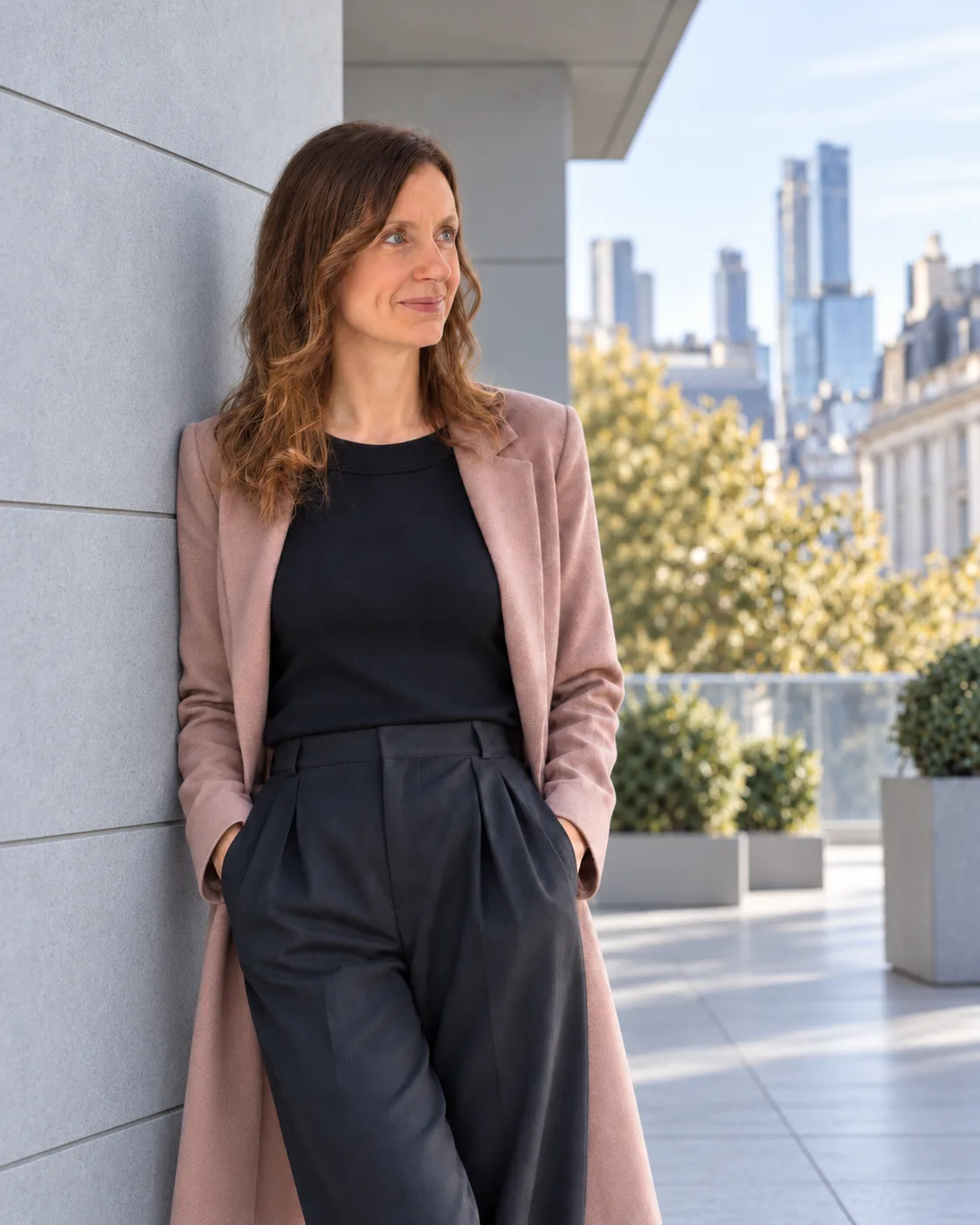 Martina Bartolomucci, life coach in London, on a terrace with the skyline in the background
